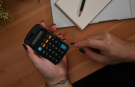 accountant using a calculator