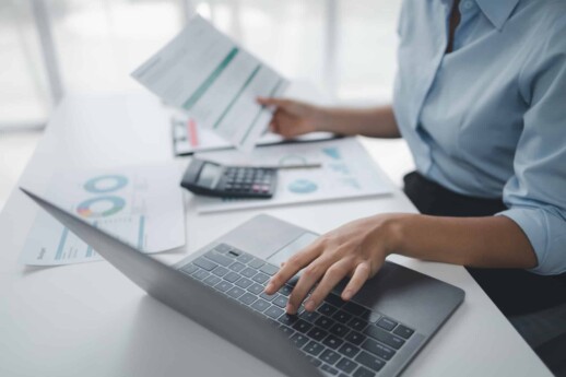 Person working with documents on desk, accountant checking company budget accounting documents, auditing financial statements, preparing company balance sheet financial statements
